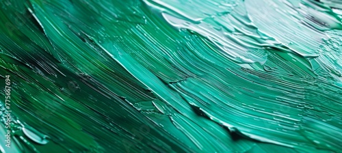 Close up of green oil paint brush strokes texture background