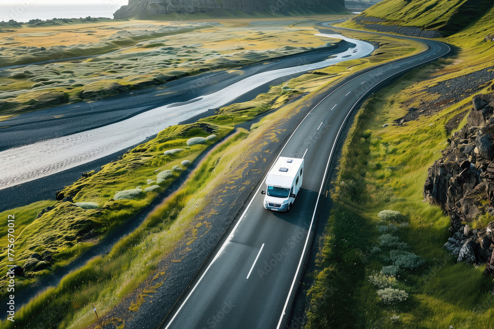 Motorhome camper van RV road trip. People on travel vacation adventure. Tourists in rental car campervan enjoying their trip to Iceland.