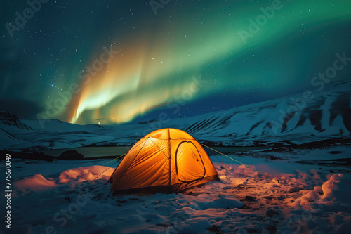 Aurora borealis over a glowing orange tent at night. Northern lights in Iceland. Starry sky with polar lights. Camping and hiking in Iceland. © Ekaterina Pokrovsky