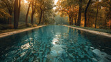 A tranquil pool's surface reflecting the surrounding trees in a soothing manner.