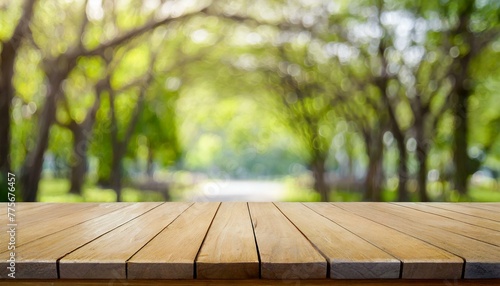 Tranquil Urban Setting: Empty Wooden Table with a View of the City Park