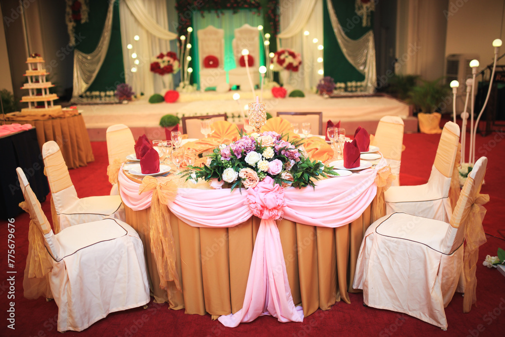 The elegant wedding reception table. Wedding table set up.