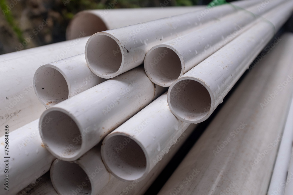 Fototapeta premium White PVC pipes ready to be installed to a new construction project