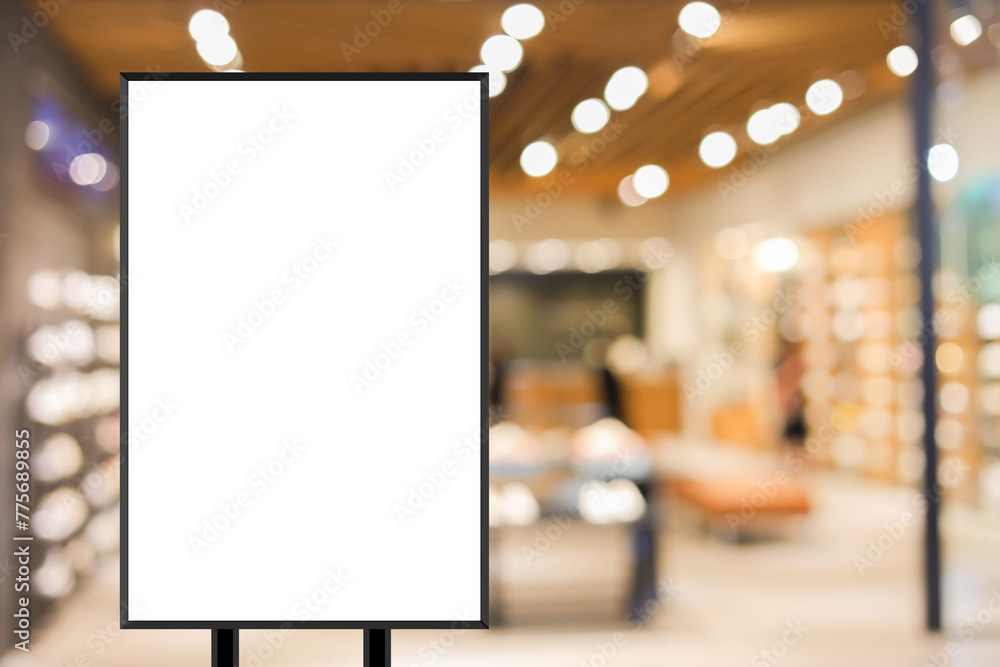 standing mockup white poster with black frame in front of blur luxury fashion shop background for show or present promotion product concept standing mockup white poster with black frame in front of blur luxury fashion shop background for show or present promotion product concept