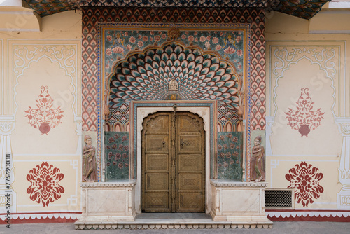 The Lotus Gate with summer flower and petal patterns, dedicated to Lord Shiva-Parvati at City Palace in Jaipur, India photo