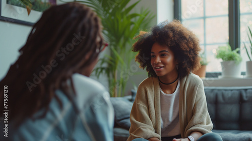 Therapy session: a young black woman in a counseling or therapy session for mental health photo