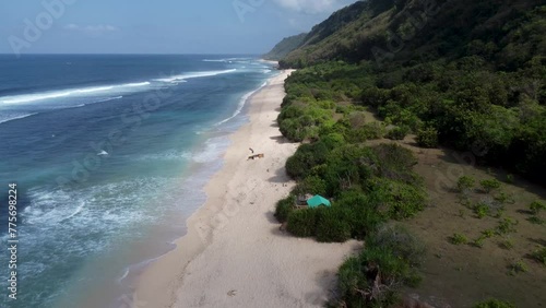 Aerial view of the coasline of Nunggalan Beach in Uluwatu Bali Indonesia photo