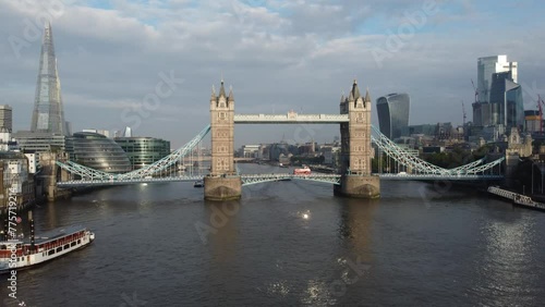 Establishing Aerial drone View of Tower Bridge, Skyline, 20, sky garden by the Thames River, United Kingdom, UK - Tower Bridge is a Grade I listed combined bascule and suspension bridge in London,  photo