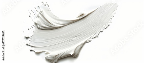 A close up of a white paint with a lot of white paint on it