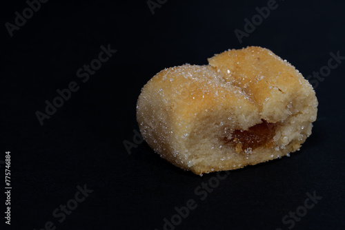 Sugared marzipan filled with jam photo