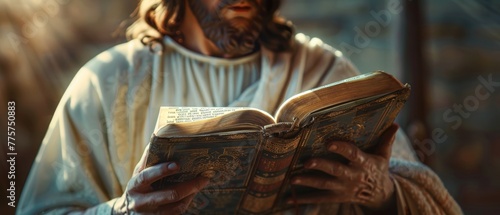 Jesus Christ holding an open Bible photo