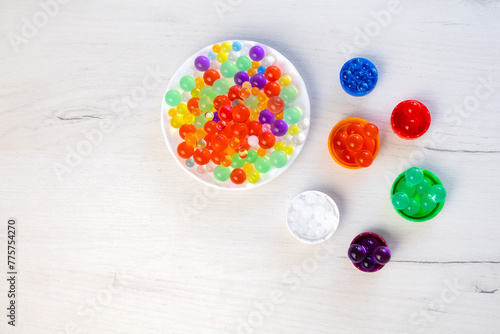 Colored balls of hydrogel, kids game, education concept.