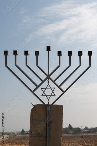 Hanukkah menorah beside a highway in Israel photo