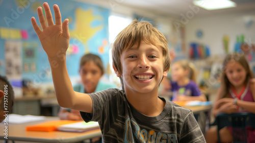 A happy Kid raising hand in classroom asking for question © Shivart