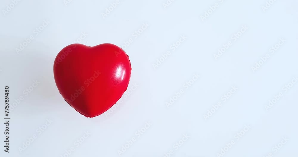 red heart symbol on white background, concept of prevention and self-care red heart symbol on white background, concept of prevention and self-care