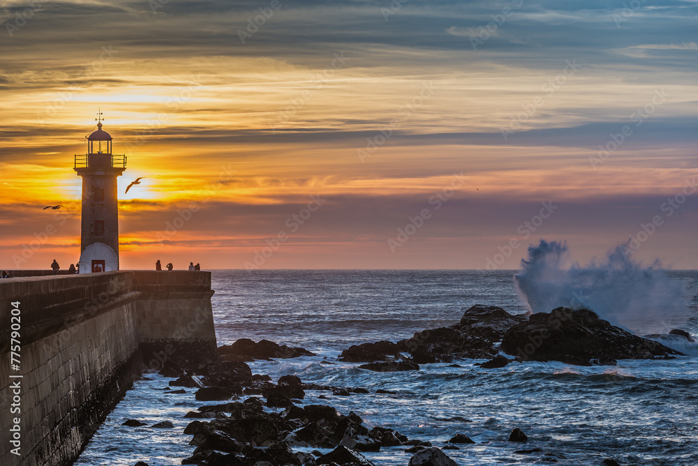 Sunset over Atlantc Ocean, view with Felgueiras Lighthouse in Porto, Portugal