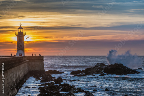 Sunset over Atlantc Ocean, view with Felgueiras Lighthouse in Porto, Portugal