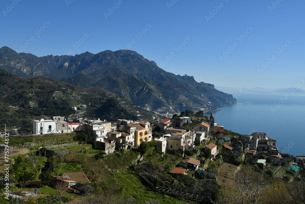 Beautiful view of the Amalfi coast in the province of Salerno, Italy under a bright blue sky
