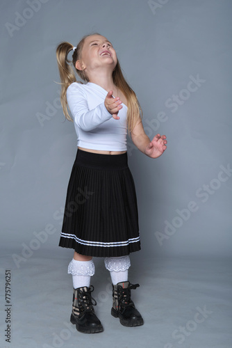 Fotografie Child in mid-twirl, her delight is infectious