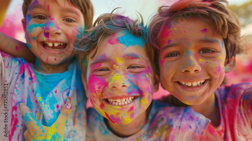Cheerful kids at the festival of colors Holi