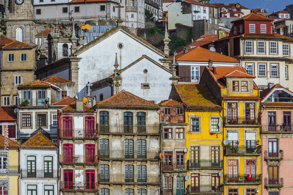 Tenement houses over Douro River in Porto, view with Church of St Nicholas, Portugal