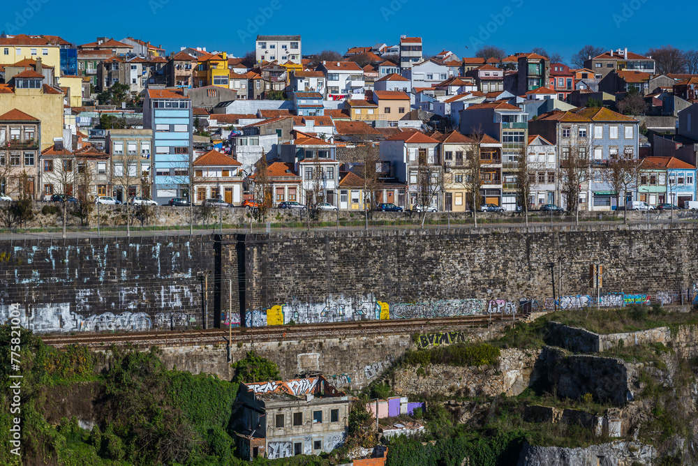 View from Infante D. Henrique Bridge on houses and railroad in Porto, Portugal