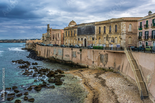 View on buildings and walls of Ortygia island, old part of Syracuse city, Sicily Island, Italy