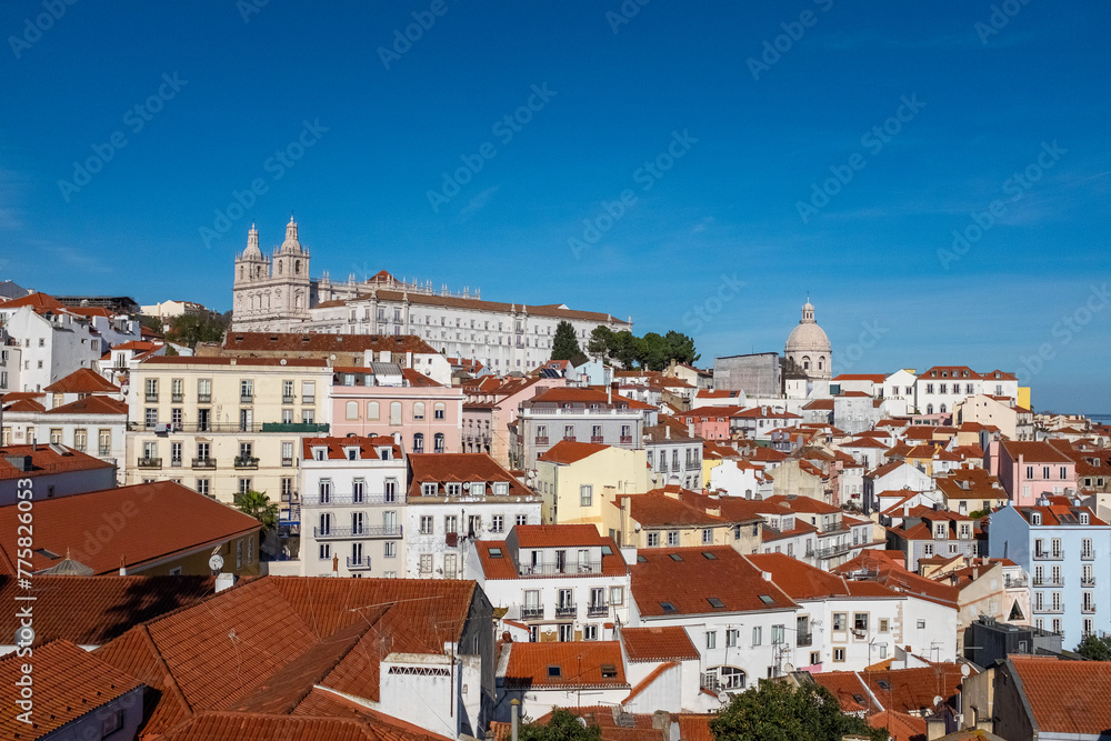 Monastery of São Vicente de Fora in the distance with blue sky in Lisbon Portugal