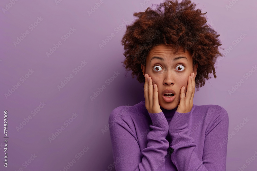 Stunned African American young woman, in casual wear, looking stressed and nervous with hands on mouth biting nails, looking aside, is going through, stands on isolated pink background
