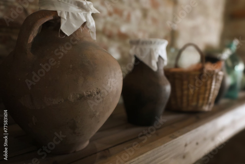 Old pantry with materials, foods and containers from long ago. Larder in the old farmhouse