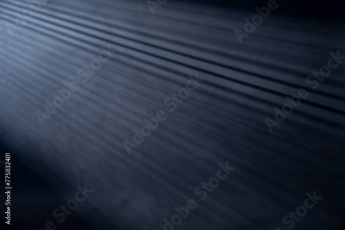 Light rays coming through the blinds isolated on black background with copy space © rangizzz