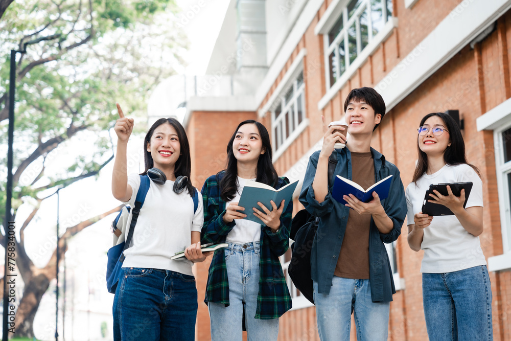 Fototapeta premium Diverse group of young adults from Asia and beyond, enjoying university life together. happy, learning, and making lifelong friendships, whether in outside class, sunny summer days or cozy weekends