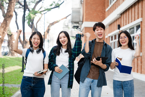 Diverse group of young adults from Asia and beyond, enjoying university life together. happy, learning, and making lifelong friendships, whether in outside class, sunny summer days or cozy weekends © makibestphoto