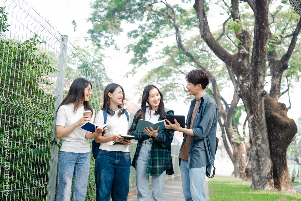 Diverse group of young adults from Asia and beyond, enjoying university life together. happy, learning, and making lifelong friendships, whether in outside class, sunny summer days or cozy weekends Diverse group of young adults from Asia and beyond, enjoying university life together. happy, learning, and making lifelong friendships, whether in outside class, sunny summer days or cozy weekends