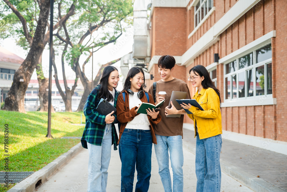 Obraz premium Diverse group of young adults from Asia and beyond, enjoying university life together. happy, learning, and making lifelong friendships, whether in outside class, sunny summer days or cozy weekends