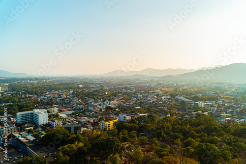 Khao Rang Phuket City View Point which shows the beauty of Phuket City, Thailand from the top of the hill. landscape from the View point showing the beauty of Phuket city, rows of hills and coastline © Yasuspade