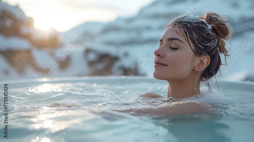 Winter relaxation Woman enjoying a hot tub with breathtaking mountain views in the background