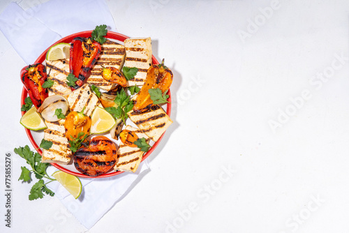 Summer vegan barbeque recipe. BBQ healthy balanced vegetarian food, grilled roasted tofu cheese steaks with vegetables