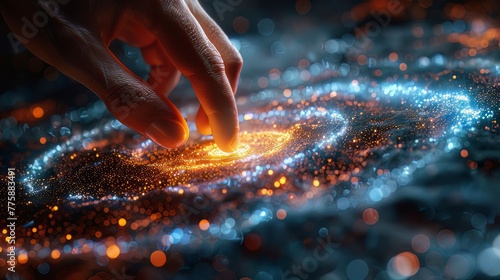 Hand touching impressive vortex of data and light particles, innovation and discovery concepts