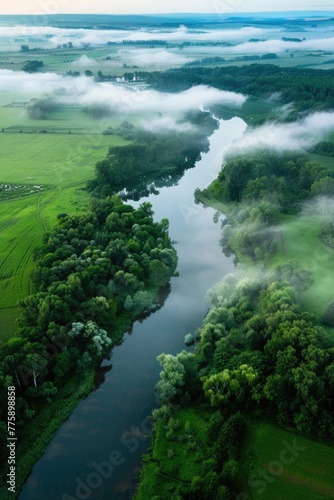 Serene river flowing through vibrant green landscape. Ideal for nature and travel concepts