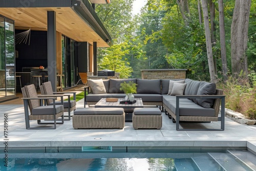 Modern outdoor patio setting with luxurious furniture arrangement