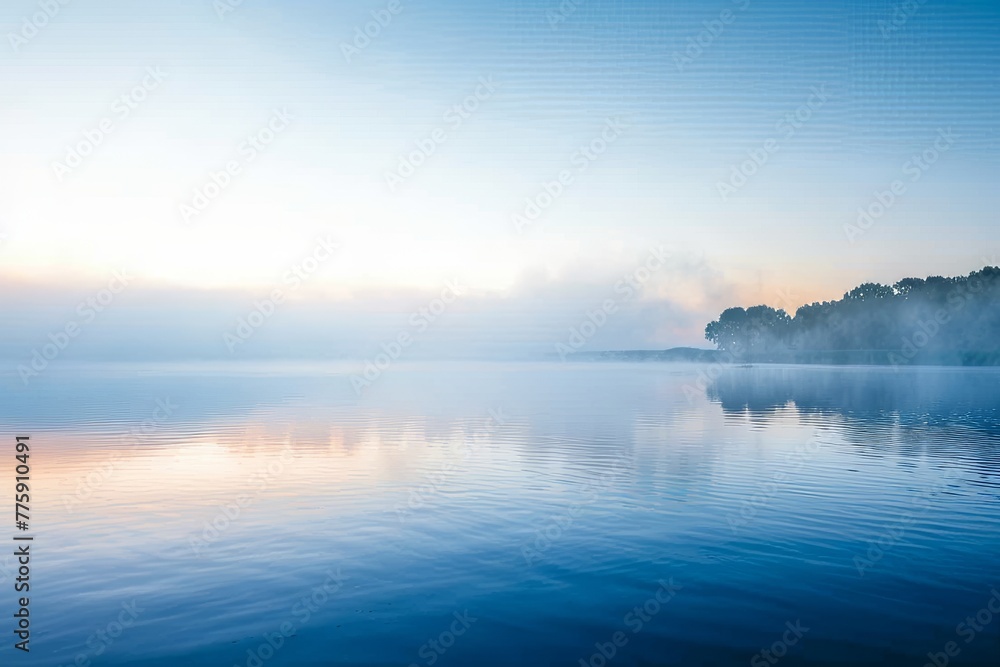Fototapeta premium A quiet lake at dawn with mist over the water, creating a tranquil and spacious backdrop for serene summer themes