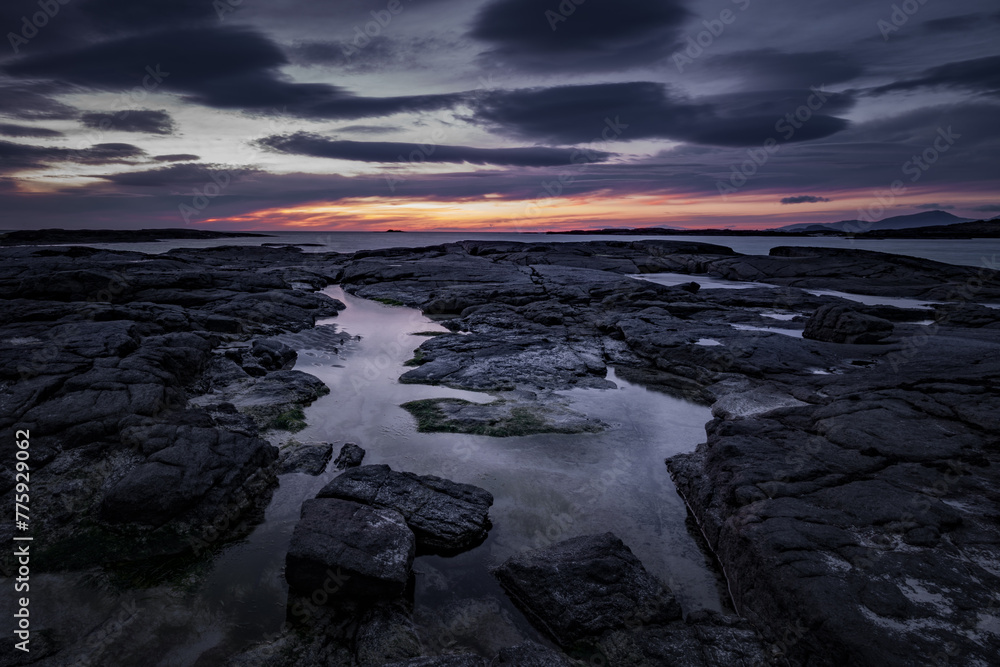 Sunset over a rock pool at Sanna Bay Sunset over a rock pool at Sanna Bay