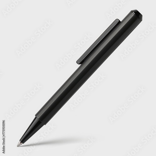 A simple black ballpoint pen on a plain white background. Perfect for office supplies or writing concepts