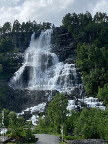 typical  high waterfall with mountains in Norway