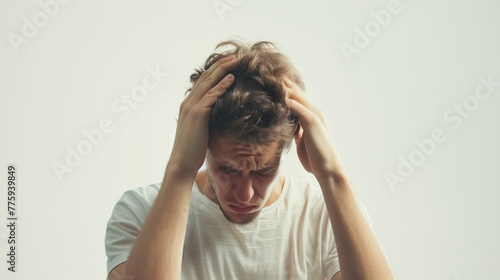 Concept for headache, A person holding their head in discomfor photo