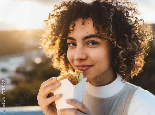 Woman eating street food snack