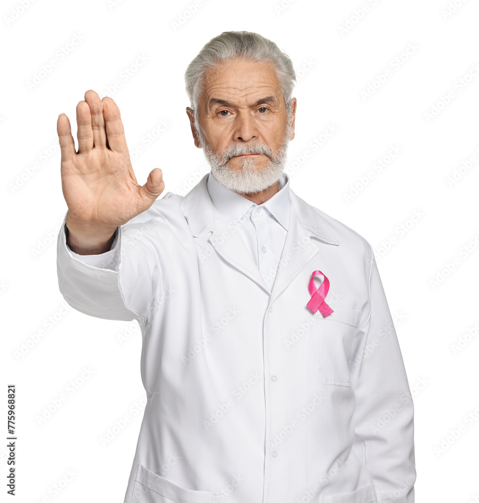 Mammologist with pink ribbon showing stop gesture on white background. Breast cancer awareness Mammologist with pink ribbon showing stop gesture on white background. Breast cancer awareness