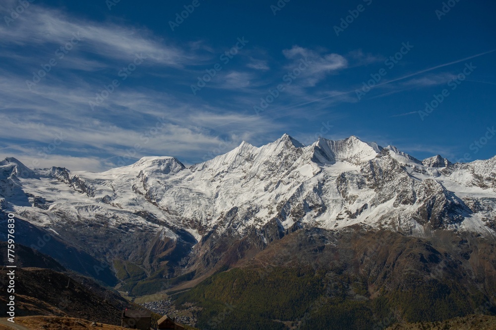 Snow covered peaks of the Swiss Alps on a sunny day, Switzerland