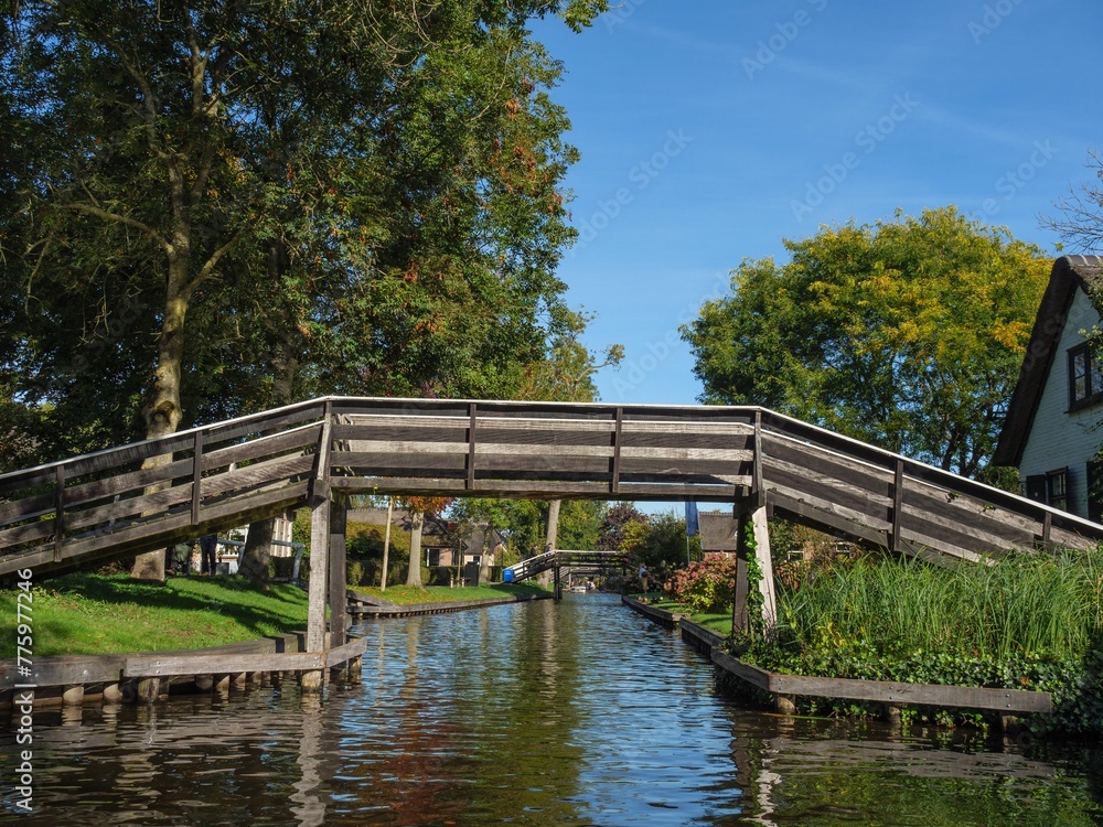 Fototapeta premium Beautiful view of a bridge over the river. Giethoorn, Overijssel, Netherlands
